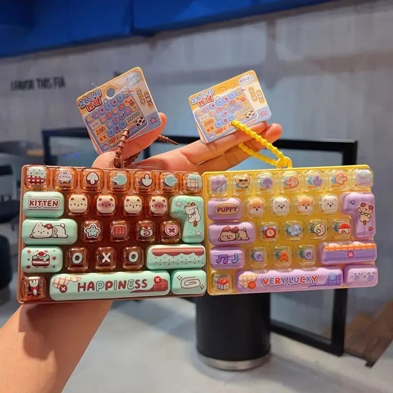 Party Games Switch - มีสินค้าในสต็อก 26Grid Keycap Clicker ของเล่นคลายเครียด คีย์บอร์ดพวงกุญแจ